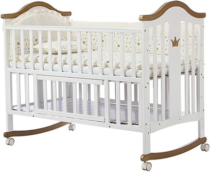 white wooden cot bed with mattress