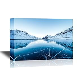 Winter Landscape with Calm Lake and Snow Covered Mountains
