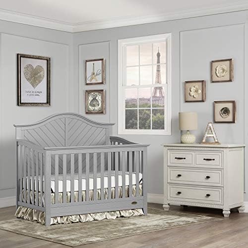 mismatched crib and dresser