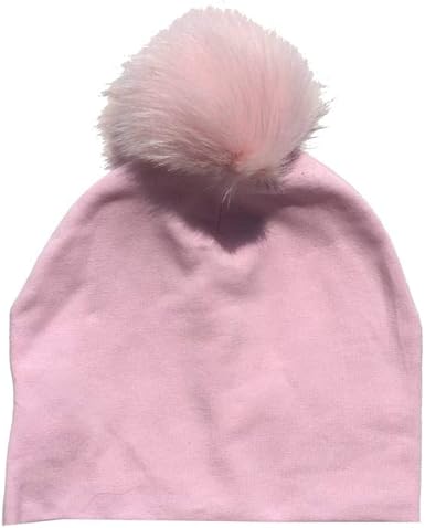 pink hat with fur pom pom