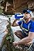 Nathan Sports Big Shot 32oz Sport Nozzle BPA Free Water Bottle with Strap Featuring LA Boston New York Miami Chicago, Multiple Color Choices Available