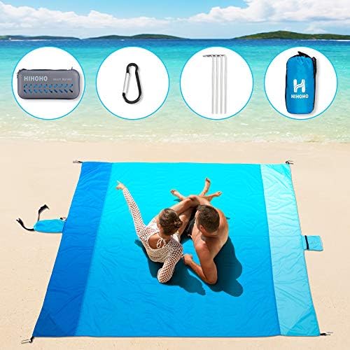 Colorful nylon beach blanket with sand-resistant design, shown with a beach bag.