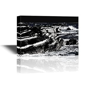 Abstract Seasape with Waves and Boulder on The Seaside