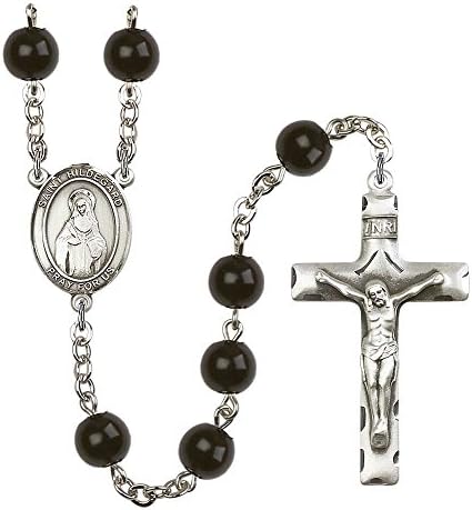 Silver Plate Rosary features 7mm Black Onyx beads. The Crucifix measures 1 3/4 x 1. The centerpiece features a St. Hildegard von Bingen medal.