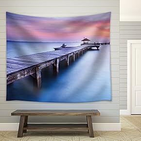 Sun Setting Over a Bridge That is on The Ocean Leading to a Kiosk - Fabric Tapestry, Home Decor - 51x60 inches