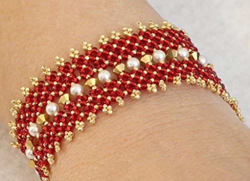 1091. Bead woven bracelet in red and gold with Swaroski faux pearls and Swaroski crystals.