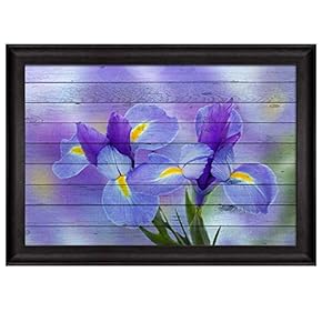 Purple Irise Flowers Over a Blurry Purple Background...