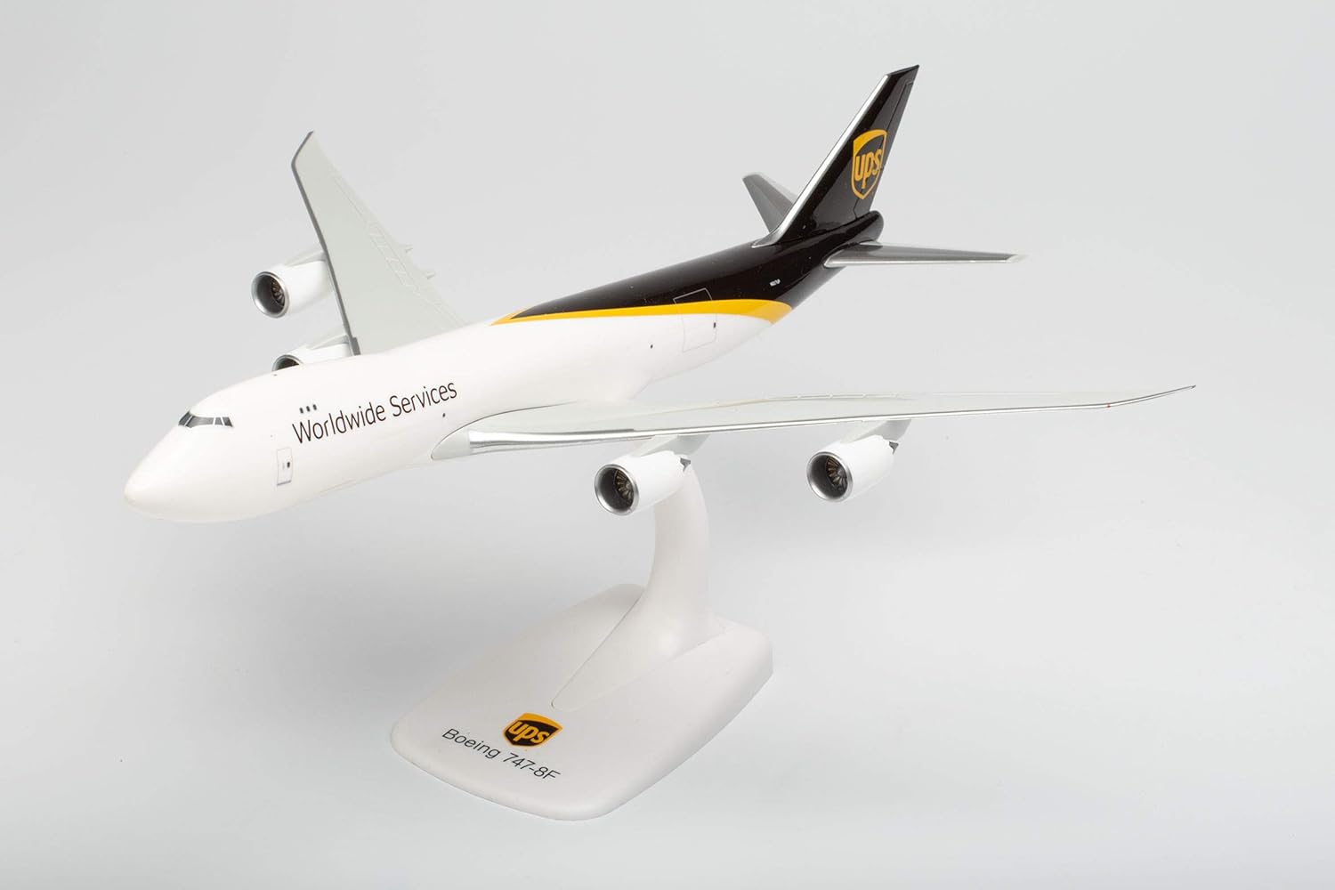 Herpa Snap-Fit airplane model UPS Boeing 747-8F on scale of 1:250, plastic miniature with pedastal, model building, collectors edition