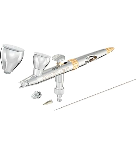 Your bridge between an airbrush and a mini spray gun! #Ad The Iwata HP-TH2 H5100 Gravity Feed Dual Action Trigger Airbrush is a gravity-feed airbrush with a .06 mm nozzle and a