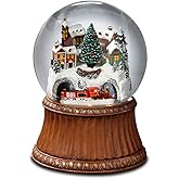 The San Francisco Music Box Company Rotating Train and Mountain Village Snow Globe