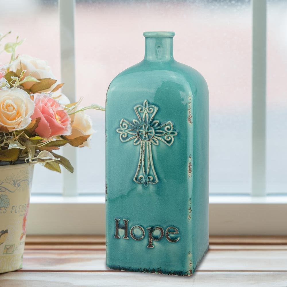 Stonebriar Decorative 12” Worn Turquoise Ceramic Bottle with Cross Detail, French Country Home Decor Accents, Vintage Vase Decoration for Dried or Artificial Flowers: Home & Kitchen