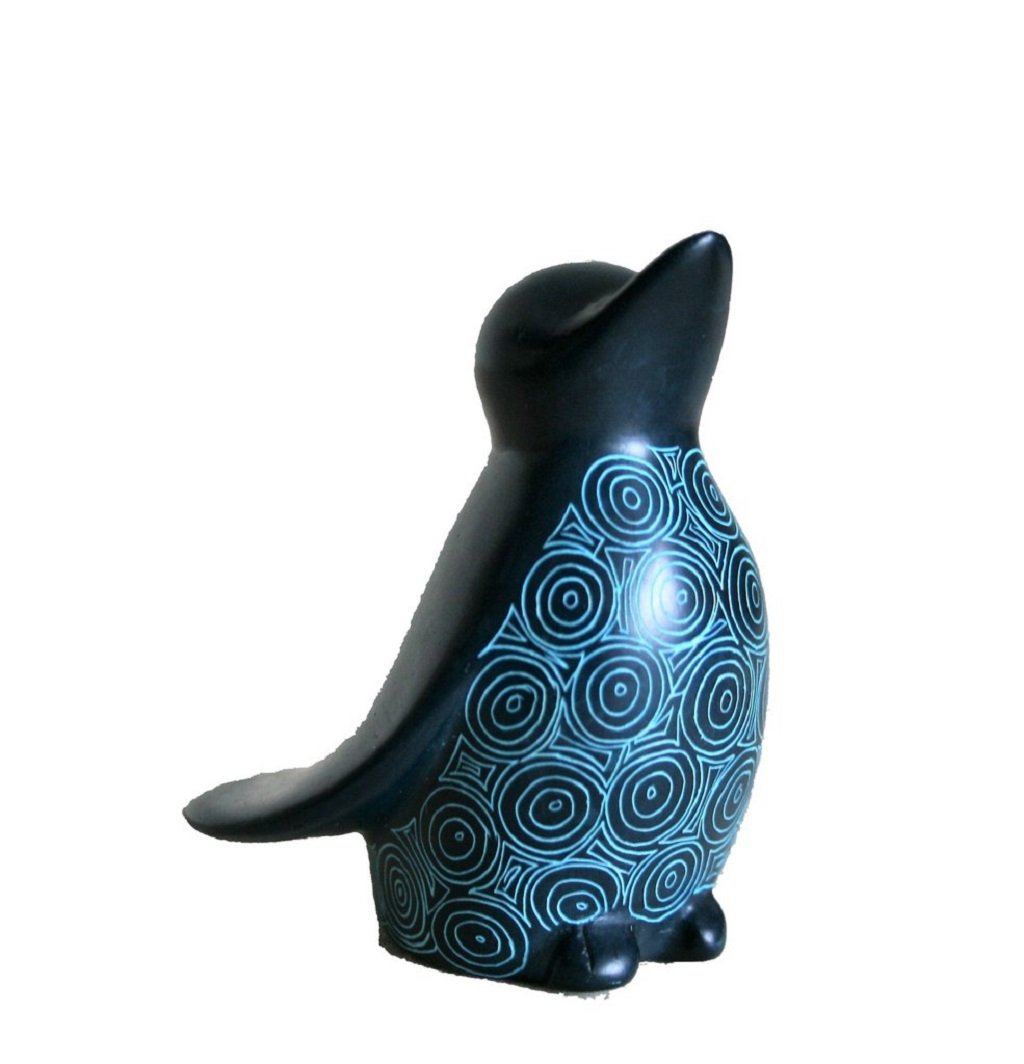 Hand carved soapstone penguin Turquoise color. Made in Kenya