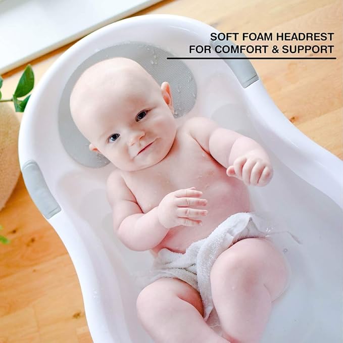 nuby baby bath with built in seat and soft headrest