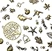 About 100 pcs or 4 oz Mixed antique Bronze assorted mix tibetan charms, pendants, elephants, birds, Tree of life, Keys, ocean life
