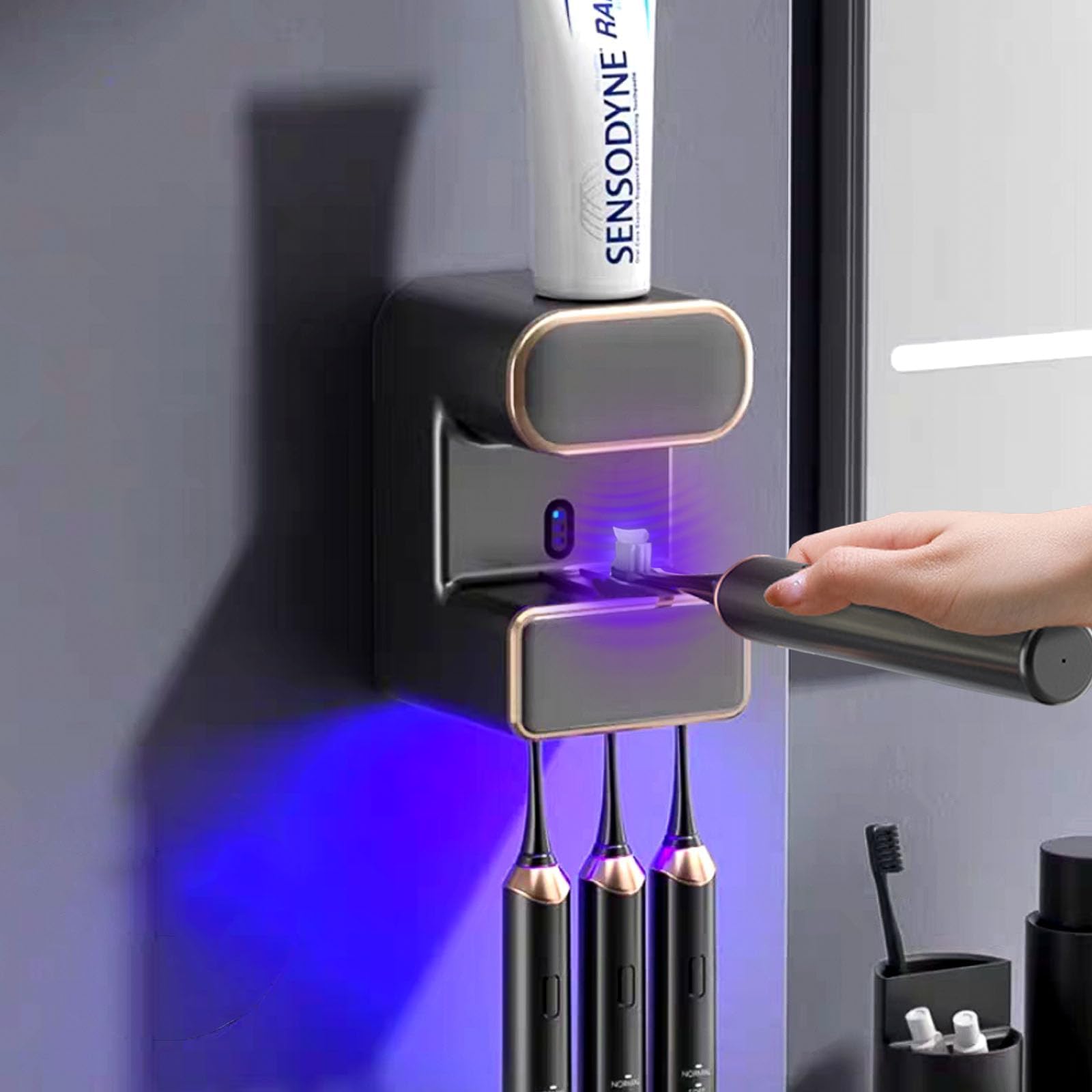 Photo 1 of **USED AND NEEDS CLEANING**Automatic Toothpaste Dispenser, Electric Toothpaste Dispenser Multi-Function, Toothpaste Dispenser Wall Mounted with 3 Brush Slots, Toothbrush Organizer and Holder for Bathroom (Black)