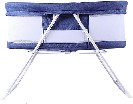 travel cot next to me