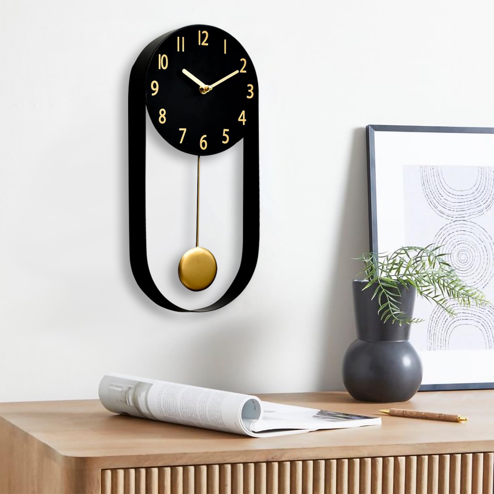 Photo 1 of EMAX HOME 8 Inch Black Wall Clock with Gold Pendulum, Silent Modern Metal Wall Clock, Minimalist Decorative Pendulum Timepiece for Living Room, Office, Kitchen