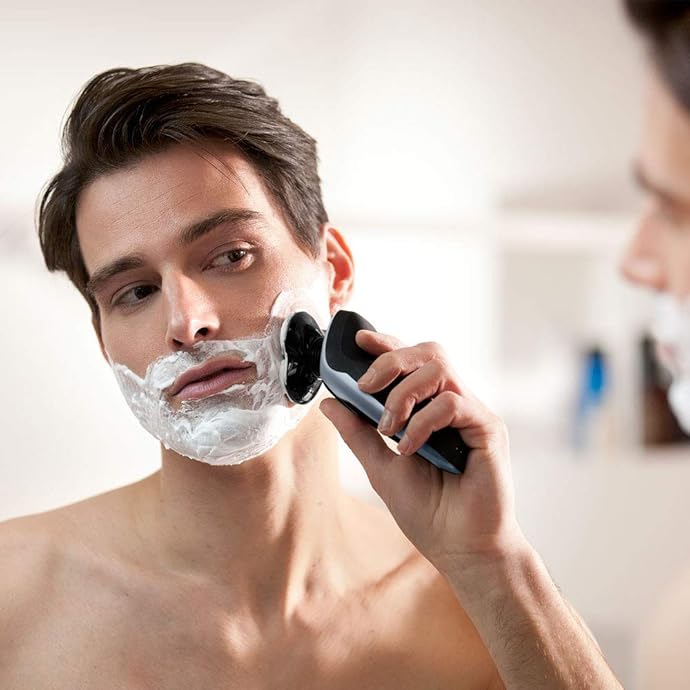 Philips 飞利浦 S9211/26 干湿两用电动剃须刀 带清洁桶 ￥1123.59