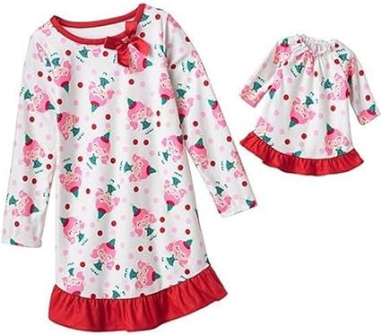 girl and doll matching christmas dresses