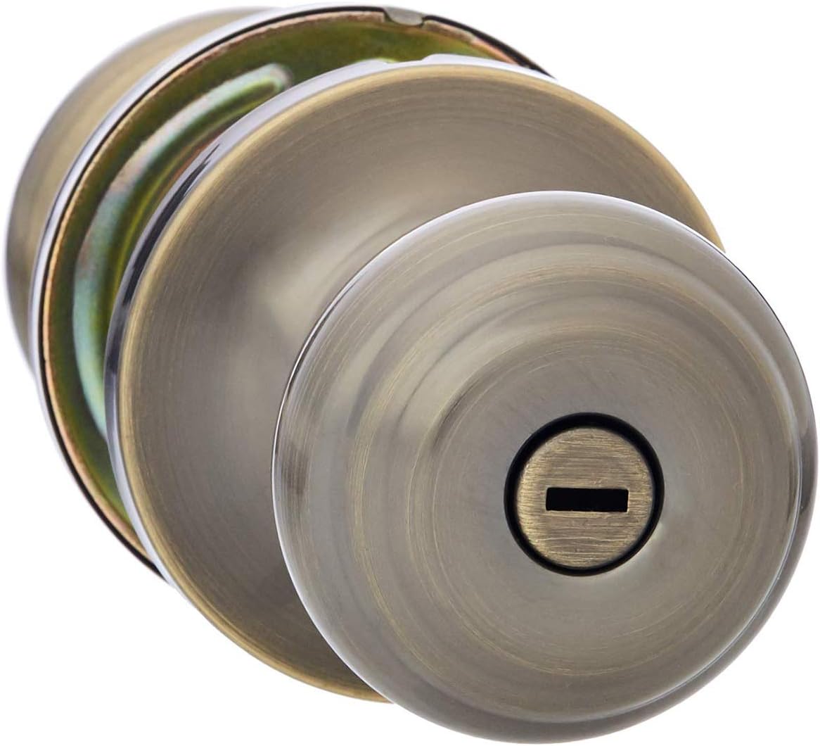 AmazonBasics Bedroom/Bathroom Door Knob With Lock, Classic, Antique Brass