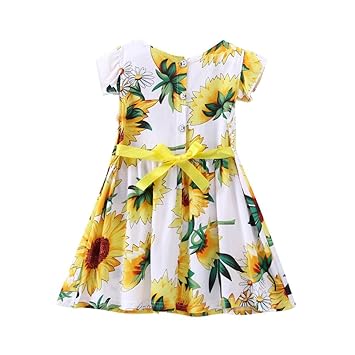 white sundress with yellow flowers