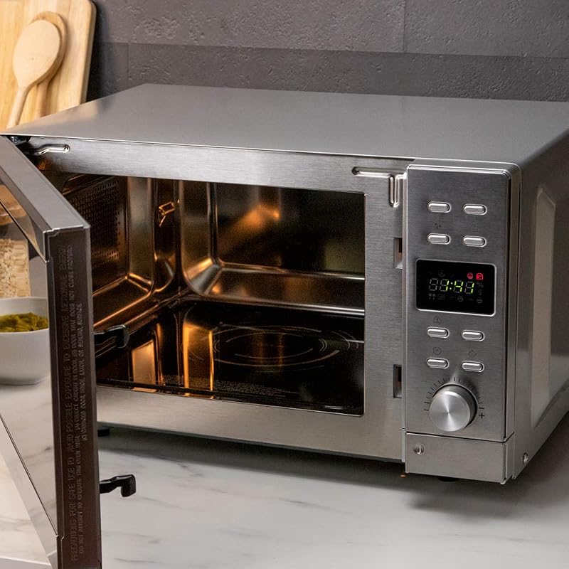 Forno a Microonde senza gradheat piatto 2300 tocco piatto bianco. Capacità 23 litri, potenza 800 W, 8 funzioni preconfigurate, timer fino a 95 minuti