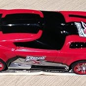 Amazon.com: Real FX Racing: Slotless Racetrack System Including Two RC Cars and Handsets with Amazon.com: Real FX Racing: Slotless Racetrack System Including Two RC Cars and Handsets with