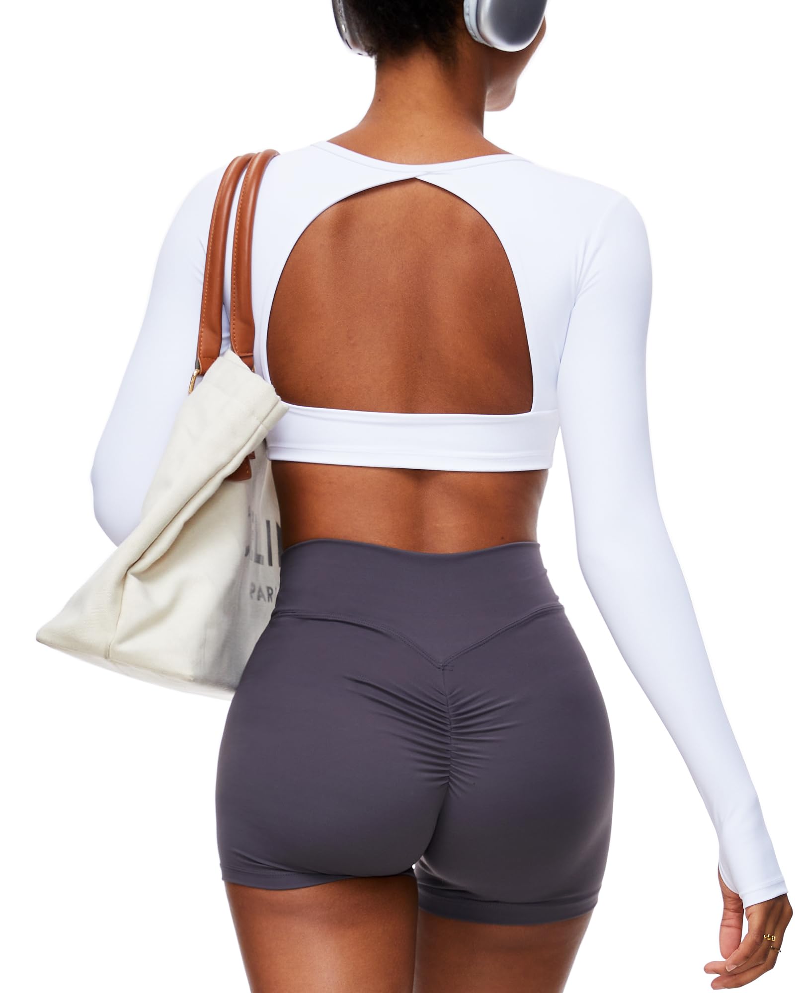 Photo 1 of *used* OZICERD Backless Workout Tops for Women Long Sleeve Gym Shirts Open Back Crop Top Cute Going Out Tops Yoga Athletic Tops White S