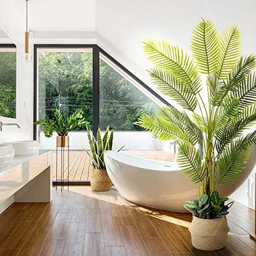 Faux palm tree in room priced at $179.99.