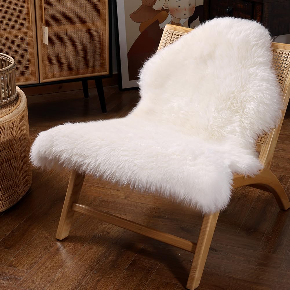 Photo 1 of IRIWOOL Premium Genuine Fur Sheepskin Rug Real Australia Sheepskin Natural Luxury Fluffy Lambskin Fur Area Rug Seat Covers for Kids Bedroom Sofa Chair Cover (Creamy White, Single Pelt/2ft x 3ft)
