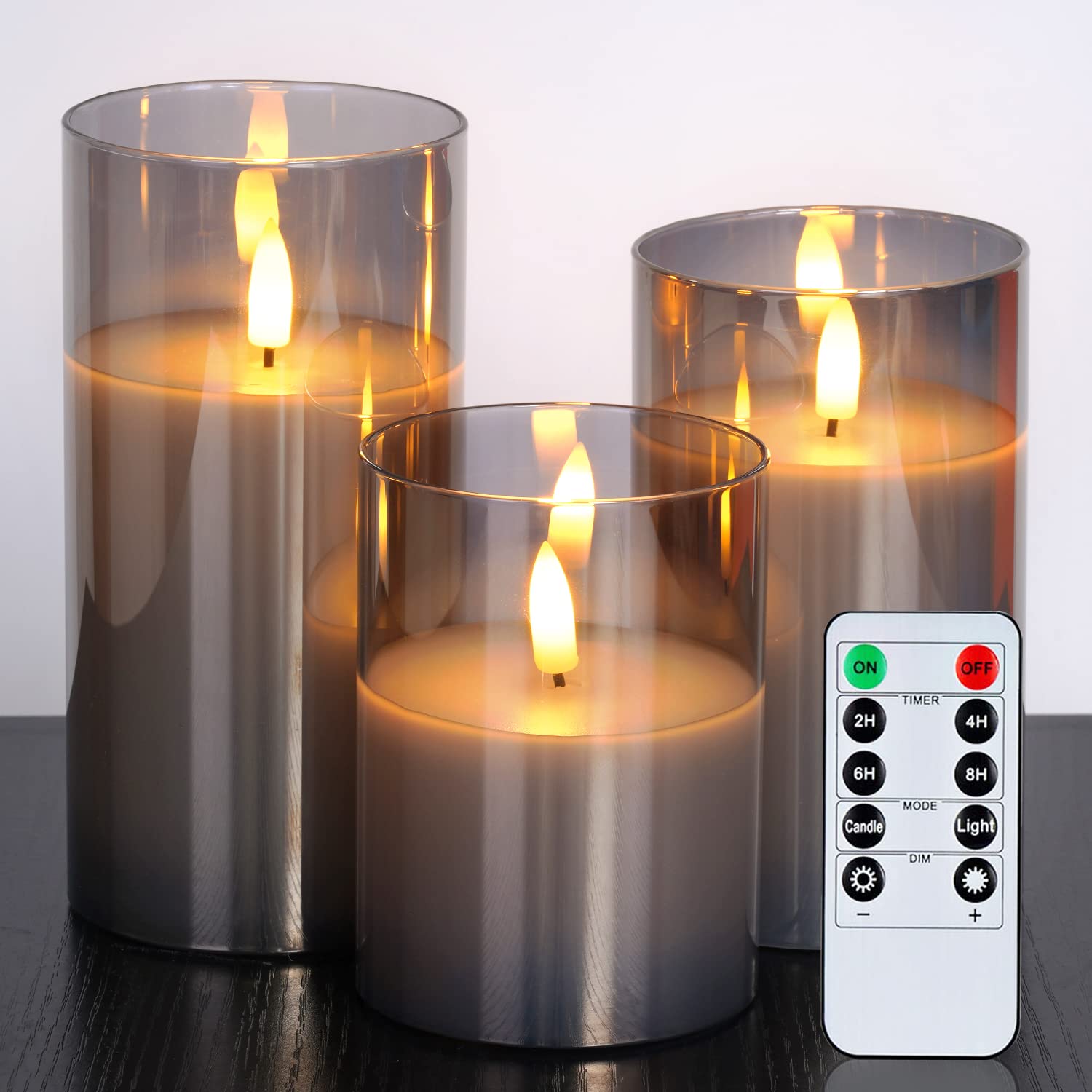 Photo 1 of Amagic Glass Flameless Candles, Battery Operated Candles, LED Pillar Candles with Remote Control and Timer, Electric Fake Candles, Wax, Grey Glass, D3 H4 5" 6", Set of 3