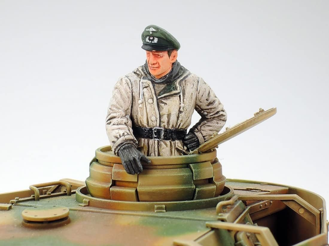 Close-up of the commander figure in the turret of the Tamiya 1/35 Pz Kpfw IV Ausf. H model, showing painted uniform details.