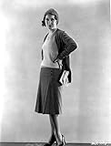 Fay Wray standing in Two Piece Dress in Black Pumps