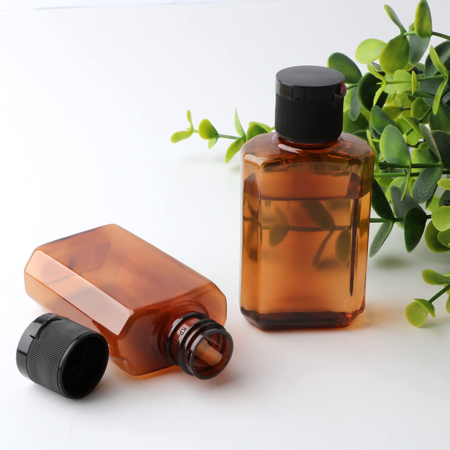 Travel Bottles 2 oz, Woaiwo-q Plastic Small Squeeze Bottles, Leak Proof Travel Size Containers With Flip Cap (32 Pack, Brown): Beauty