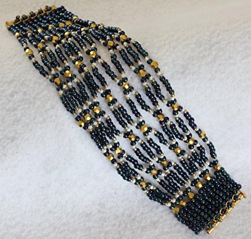 1168. Navy and gold netted string bracelet with a slide tube clasp.