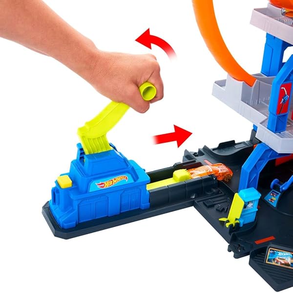 HOT WHEELS TOY CAR TRACK SET WITH DIE-CAST CAR & HELICOPTER, 2 LOOPS, STORAGE FOR 36 1:64 SCALE VEHICLES, SPEED SNAP ADAPTERS, MEGA LOOP GARAGE