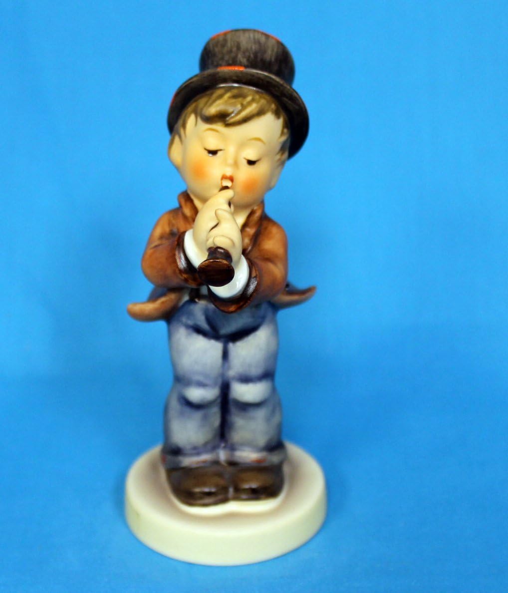 hummel boy playing flute