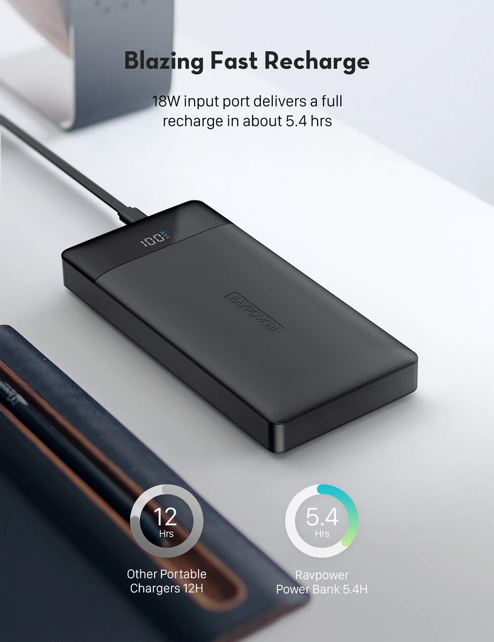 Black portable charger on table.