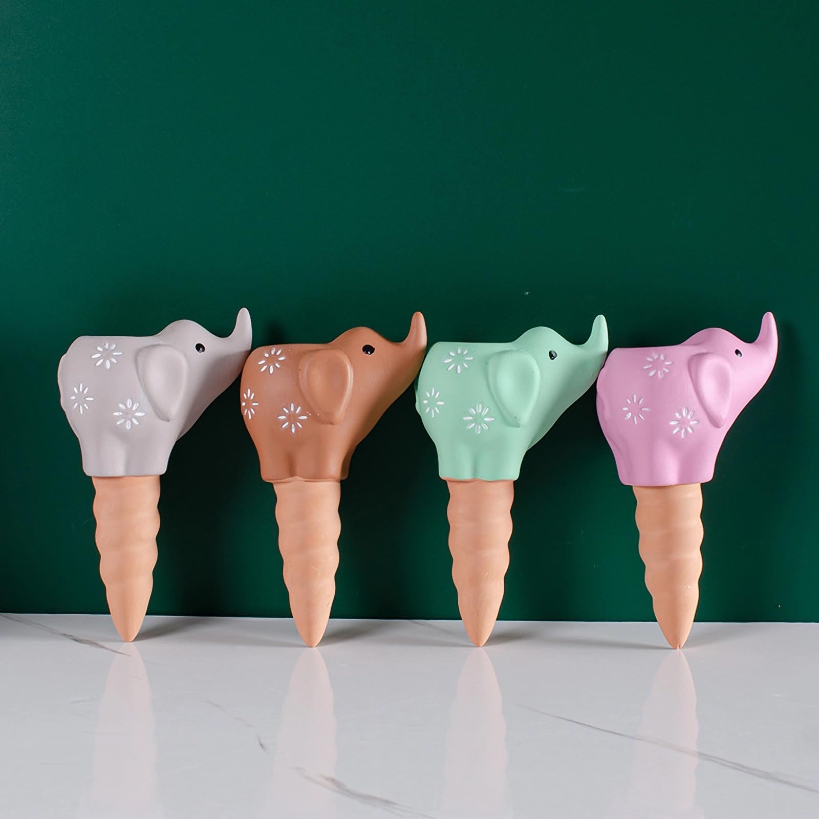 Photo 1 of QinSuiKai 4 Pack Plant Watering Devices, Elephant Shape Terracotta Watering Spikes, Vacation Self Watering Planter Insert, Automatic Plant Waterer for Indoor Outdoor Plants