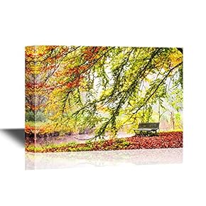 Canvas Wall Art - Beautiful Autumn View of a Bench Under a Bright Colored Autumn Tree - Gallery Wrap Modern Home Art | Ready to Hang - 12x18 inches
