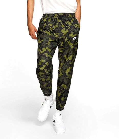 green nike trousers