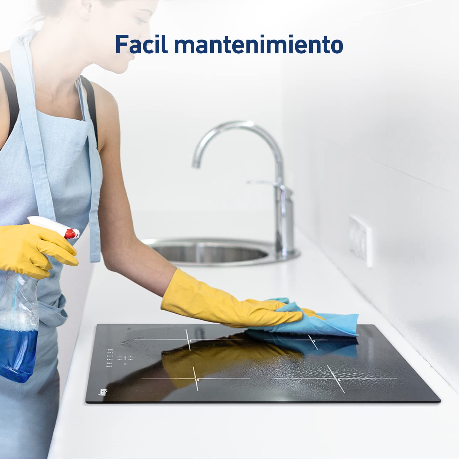 Person cleaning an IsEasy Induction Hob