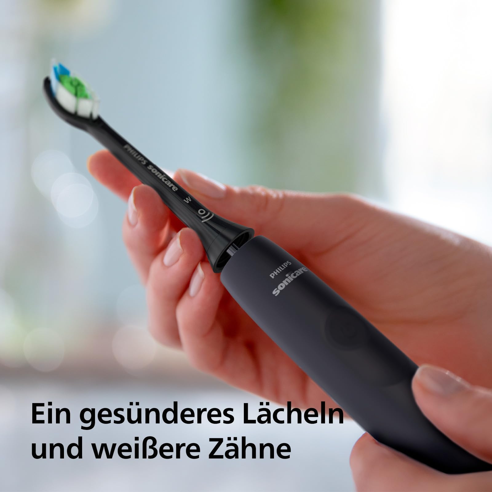 Philips Sonicare 4100 – elektrische Sonicare Zahnbürste für Erwachsene mit 1 x Philips W2 Optimal White Bürstenkopf in Schwarz, schlankem Reiseetui und USB-Ladegerät (Modell HX3683/54) 3