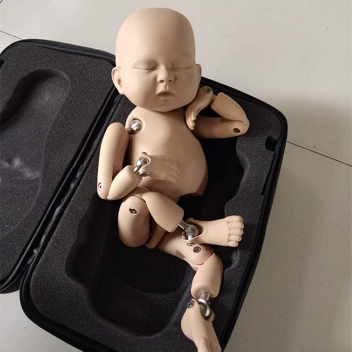 posing baby doll for photography