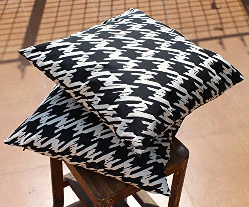 preety black houndstooth print on white colour on durable canvas fabric