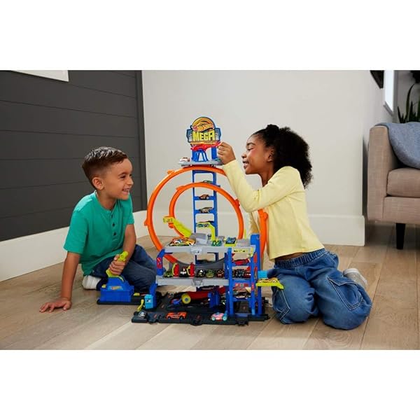 HOT WHEELS TOY CAR TRACK SET WITH DIE-CAST CAR & HELICOPTER, 2 LOOPS, STORAGE FOR 36 1:64 SCALE VEHICLES, SPEED SNAP ADAPTERS, MEGA LOOP GARAGE