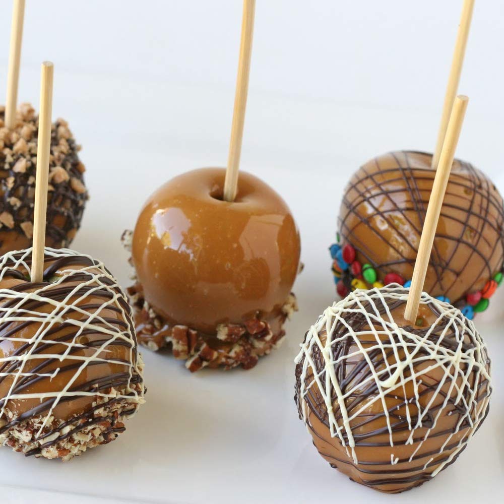 Яблоко в карамели. Как делать яблоко в карамели. Яблоко в карамели на палочке. Вяленые яблоки в карамели. Яблоко в карамели на палочке.