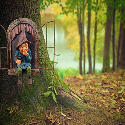 Humorous garden gnome ornament standing by a tree in a yard.