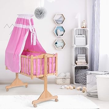 pink swinging crib