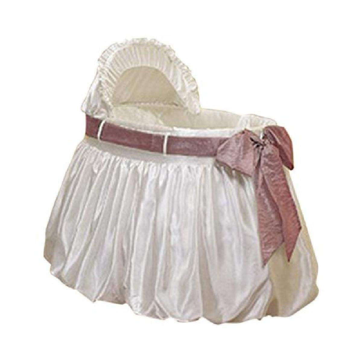 pink and white bassinet